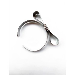 BRACCIALE A FORMA DI FIOCCO IN METALLO BRACCIALE A FORMA DI FIOCCO IN METALLO