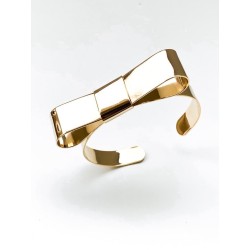 BRACCIALE A FORMA DI FIOCCO IN METALLO BRACCIALE A FORMA DI FIOCCO IN METALLO