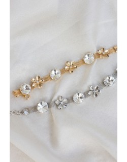 BRACCIALE CON RIVOLI E FIORELLINI